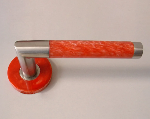 Inserto per maniglia per porta color corallo perlato