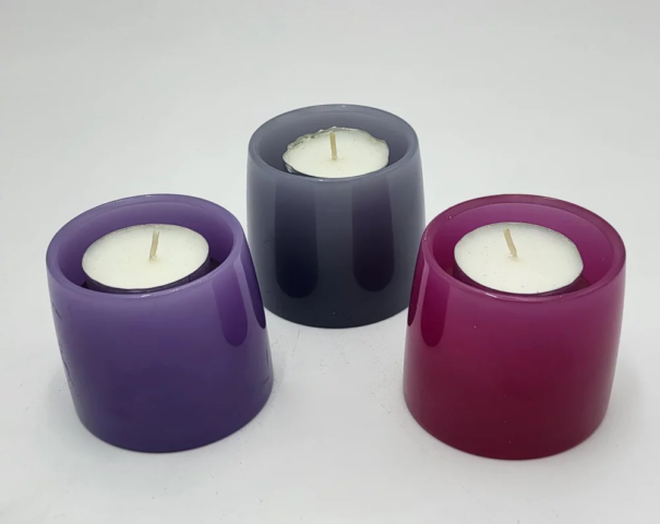 Candele porta-lumino a sezione cilindrica di vari colori